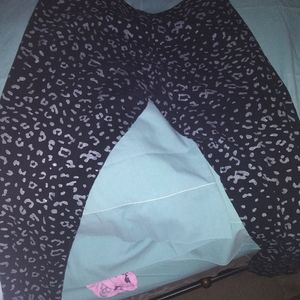 Black leggings with white/creme colored print